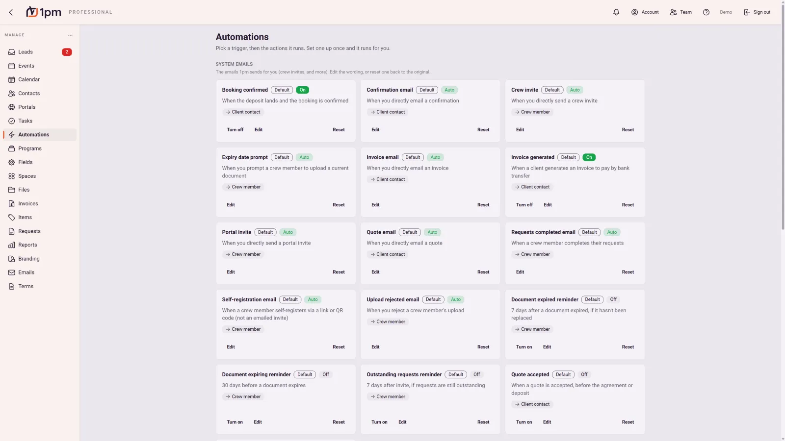 The Automations page in 1pm: a grid of system emails including booking confirmed, confirmation email, crew invite, expiry date prompt, invoice email, invoice generated, portal invite, quote email, requests completed, self-registration, upload rejected, document expired and quote accepted, each labelled with what fires it and whether it is on, off, or automatic.
